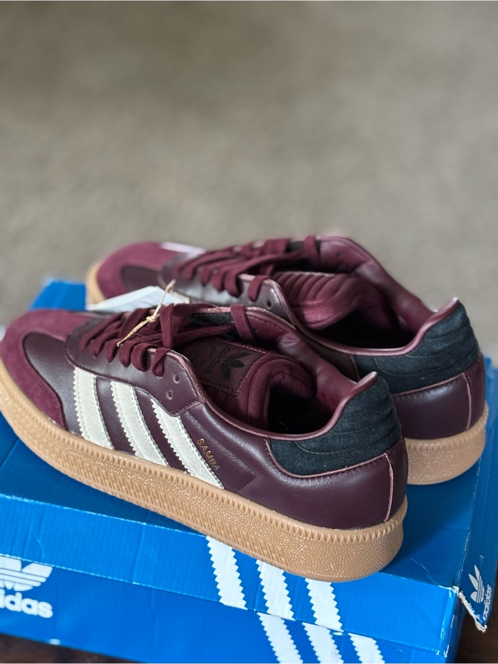 Red and tan Samba’s with white stripes brand new with box